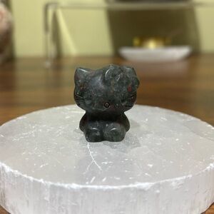 African bloodstone hello kitty carving